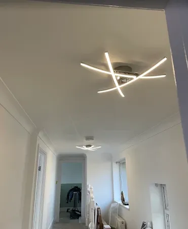 Modern LED ceiling light fittings along a landing